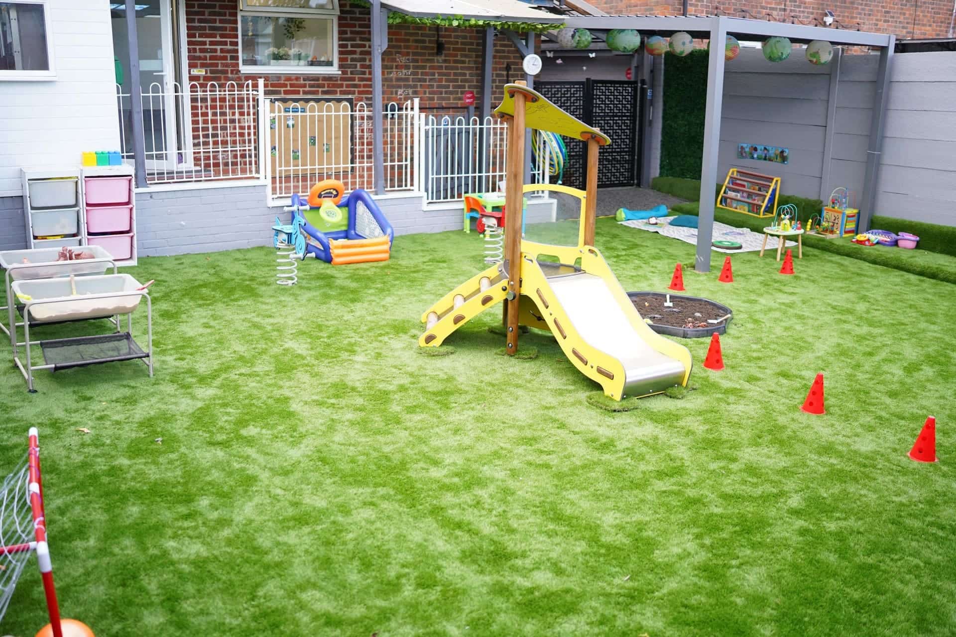 Children learning outdoors at Blue Nest Forest School in Harrow