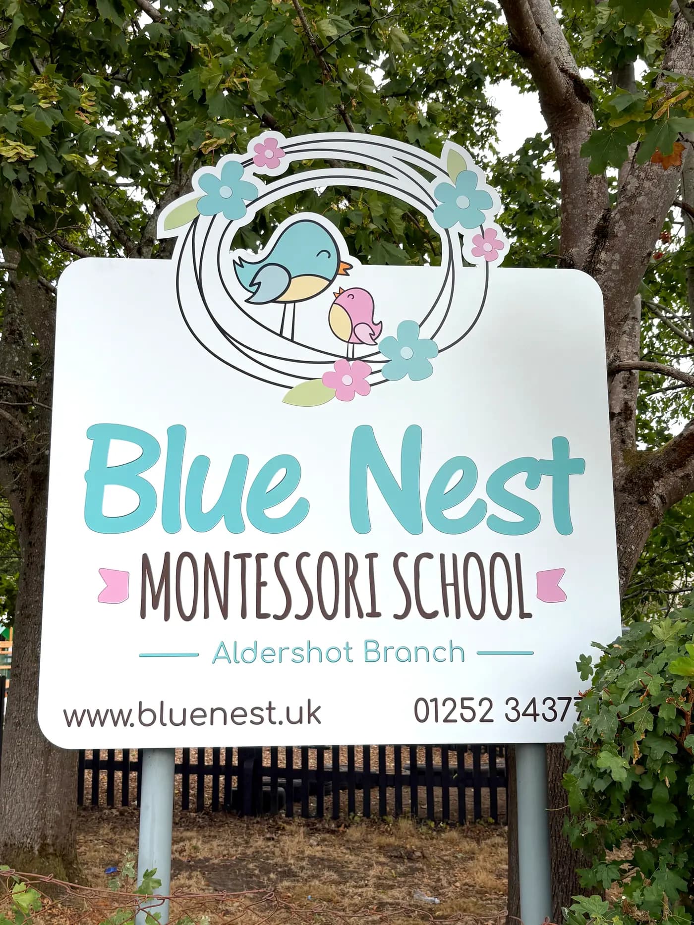 The Blue Nest Montessori School Aldershot branch sign on Belle Vue Road